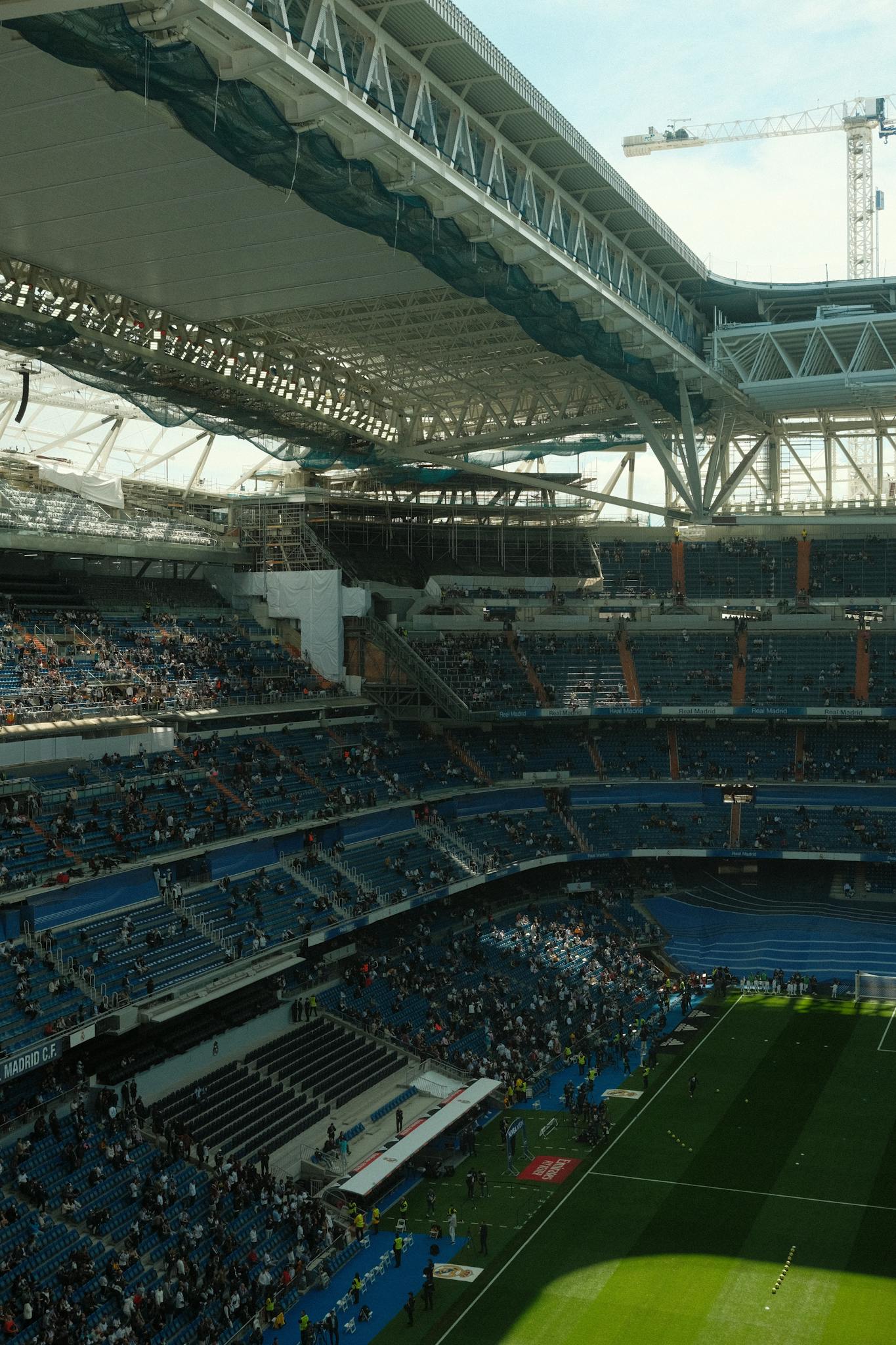 Vibrant view of a football stadium filled with fans, capturing the energy of a live match.